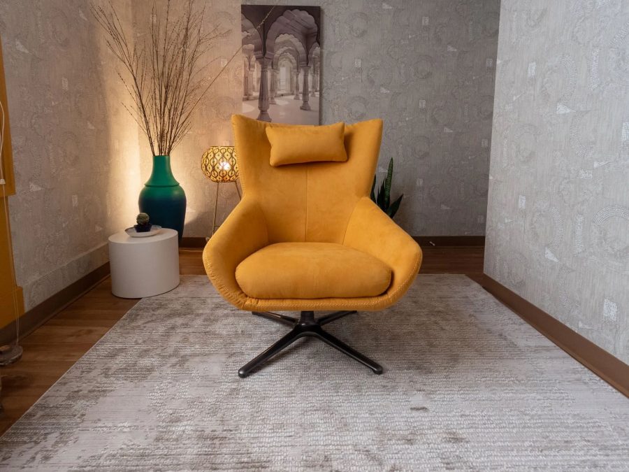 A bright yellow single sofa with clean lines and a comfortable seating cushion.